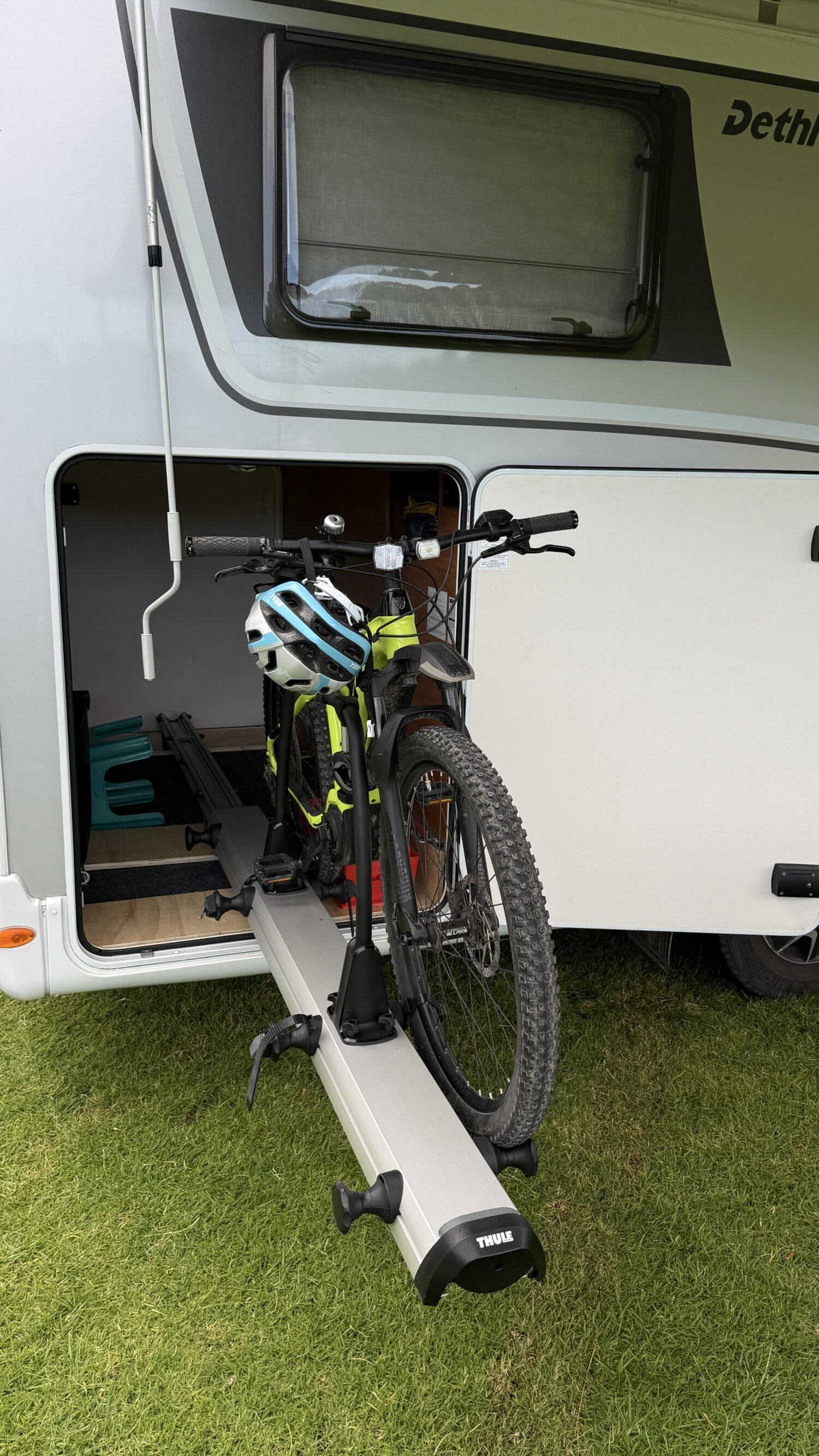 Sammy 4 berth campervan rental in New Zealand with bike rack, awning and twin bed