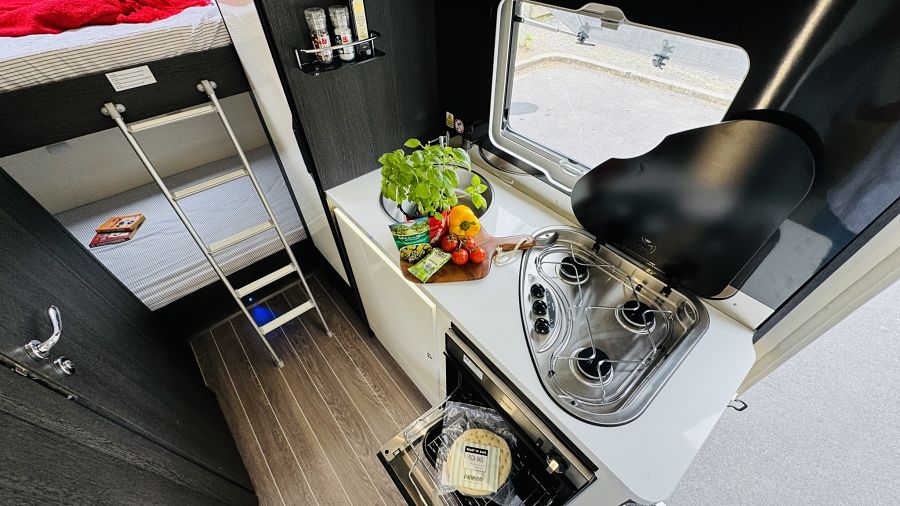 Sally - 6 berth campervan rental in New Zealand with bike rack, awning and bunk beds