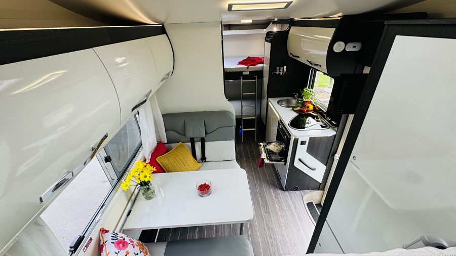 Sally - 6 berth campervan rental in New Zealand with bike rack, awning and bunk beds