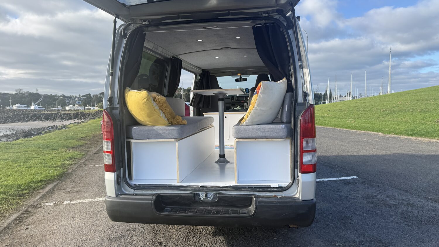 Carly 2 Berth Toyota Hiace Budget Campervan for rent from Nomado Auckland & Christchurch Location